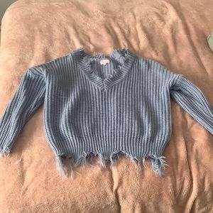 Light blue sweater